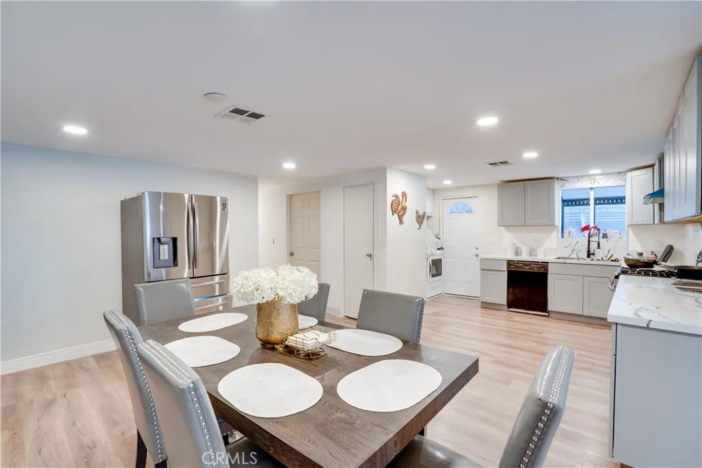 3700 Buchanan Street, Unit 189 Riverside, CA 92501 - Photo 17 of 44 a large kitchen with a table and chairs