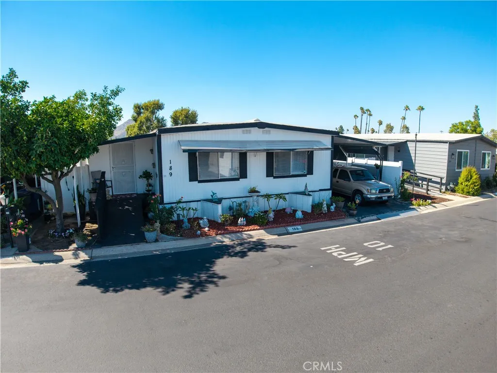 3700 Buchanan Street, Unit 189 Riverside, CA 92501 - Photo 26 of 44 a front view of a house with sitting area
