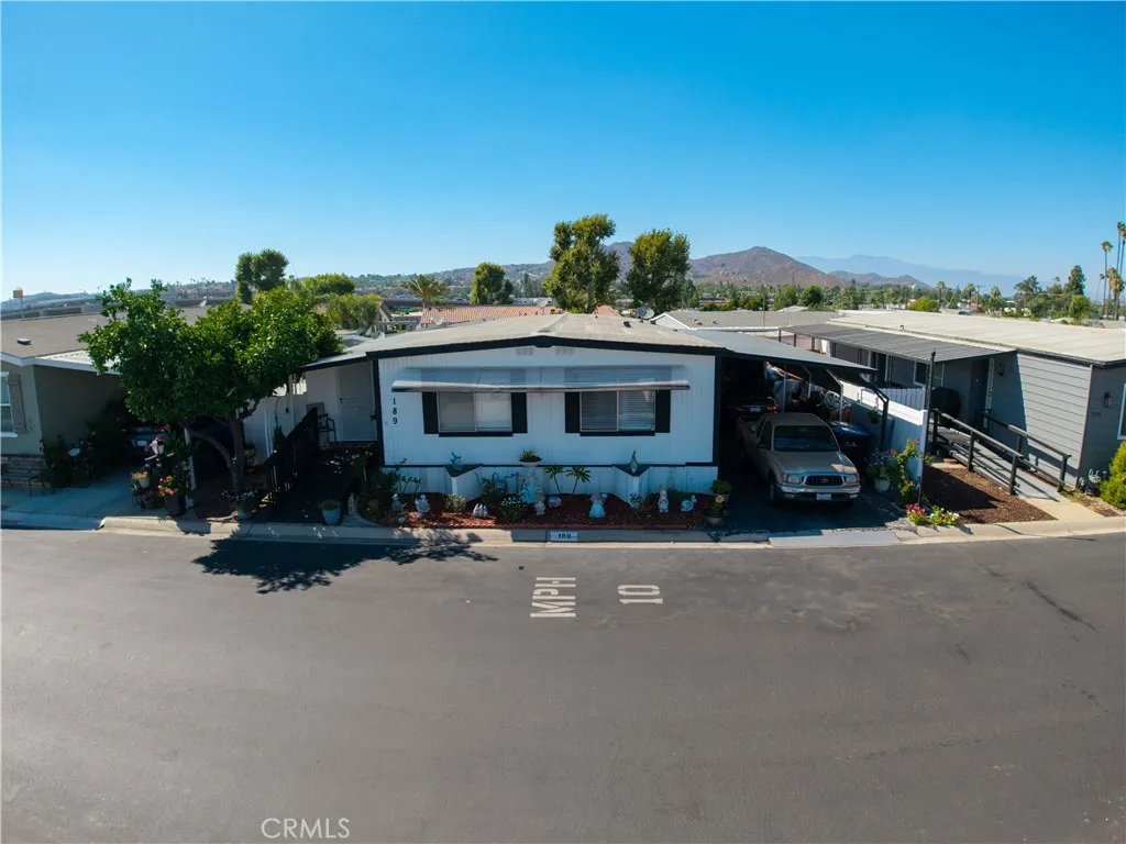 3700 Buchanan Street, Unit 189 Riverside, CA 92501 - Photo 29 of 44 a view of a house with sitting area and roof