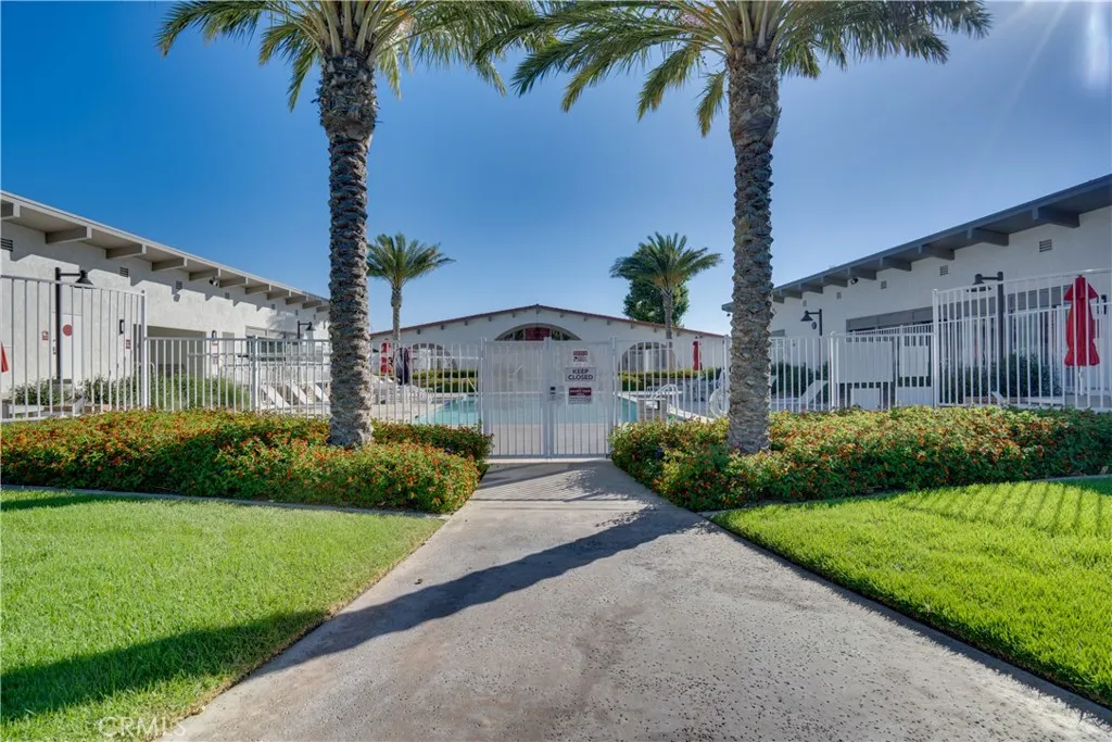 3700 Buchanan Street, Unit 189 Riverside, CA 92501 - Photo 37 of 44 a front view of a house with a garden and yard