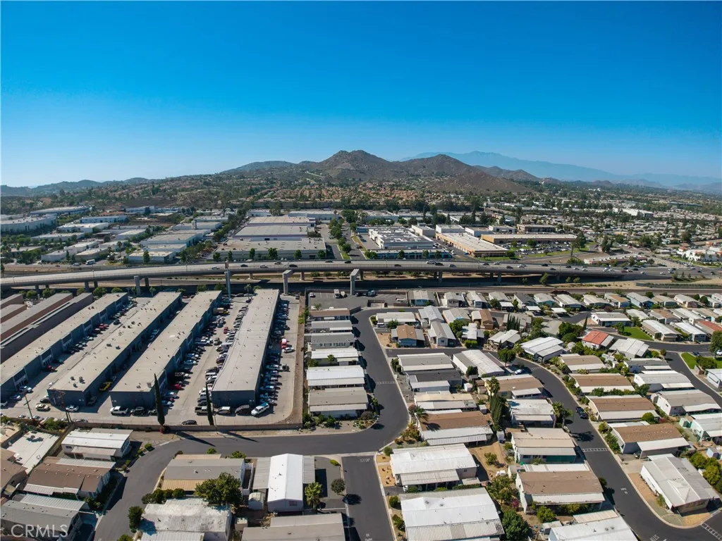 3700 Buchanan Street, Unit 189 Riverside, CA 92501 - Photo 39 of 44 an aerial view of residential building and car parked