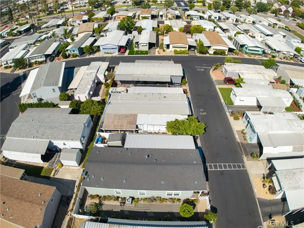 3700 Buchanan Street, Unit 189 Riverside, CA 92501 - Photo 42 of 44 an aerial view of a house with a swimming pool
