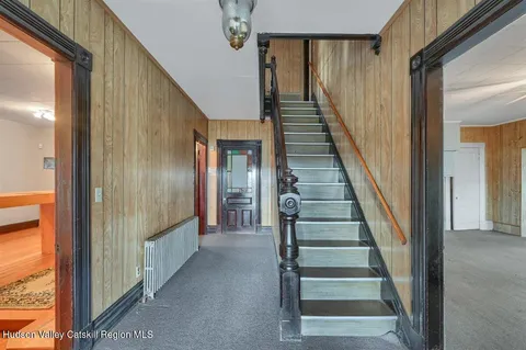 a room with cabinets and wooden floor