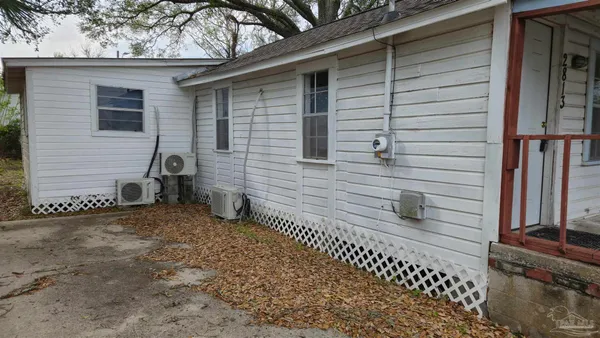 a view of a porch with a bench