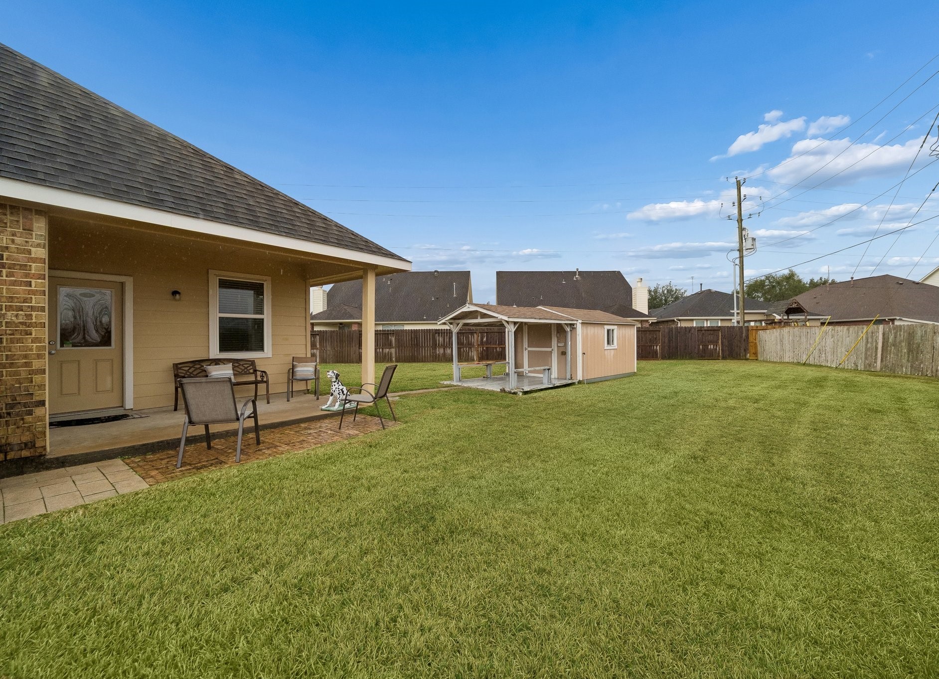 1972 Jobes Court Alvin, TX 77511 - Photo 30 of 39 Covered patio, workshop/storage.