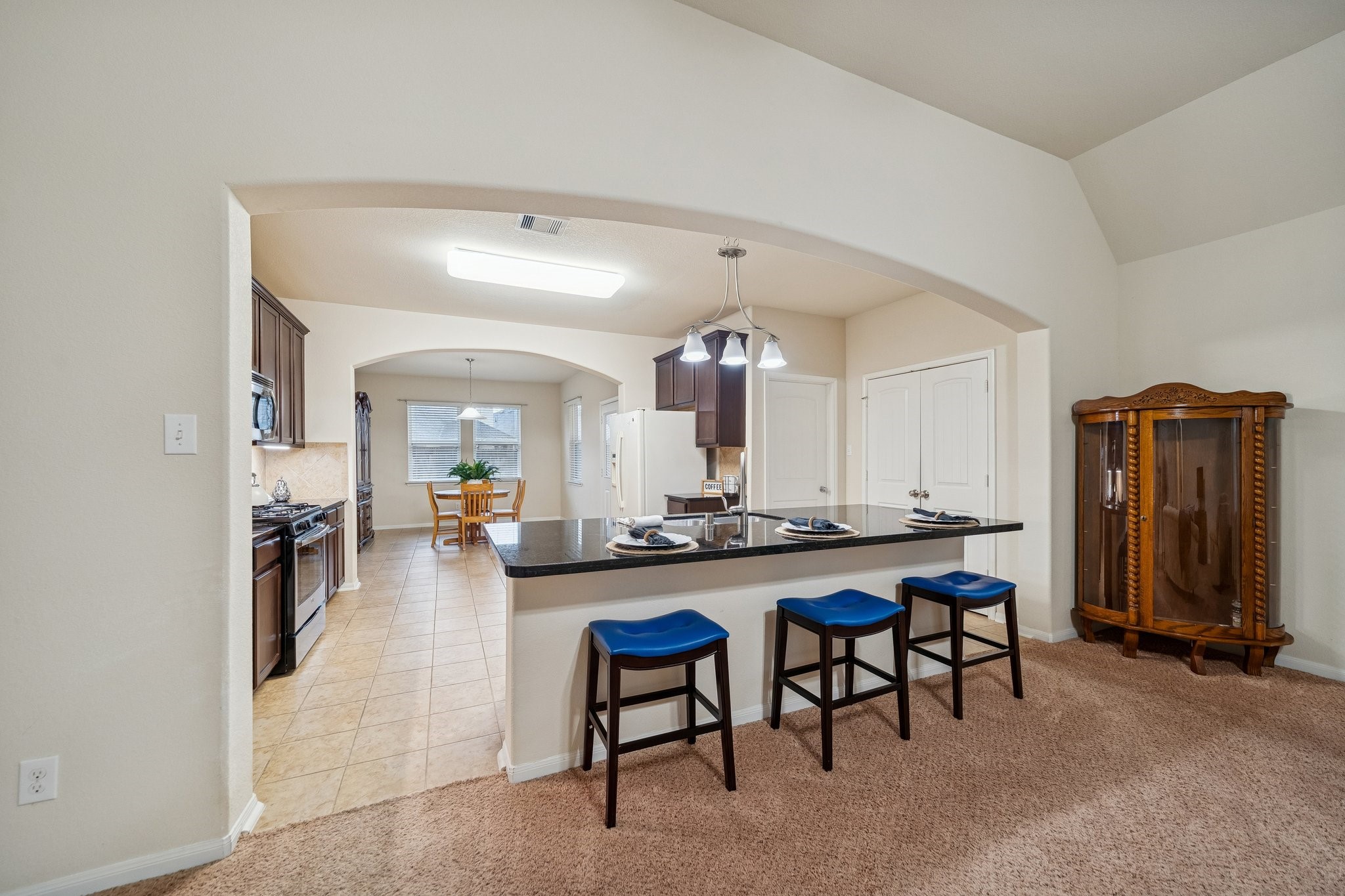 1972 Jobes Court Alvin, TX 77511 - Photo 4 of 39 Kitchen has granite island overlooks large den.