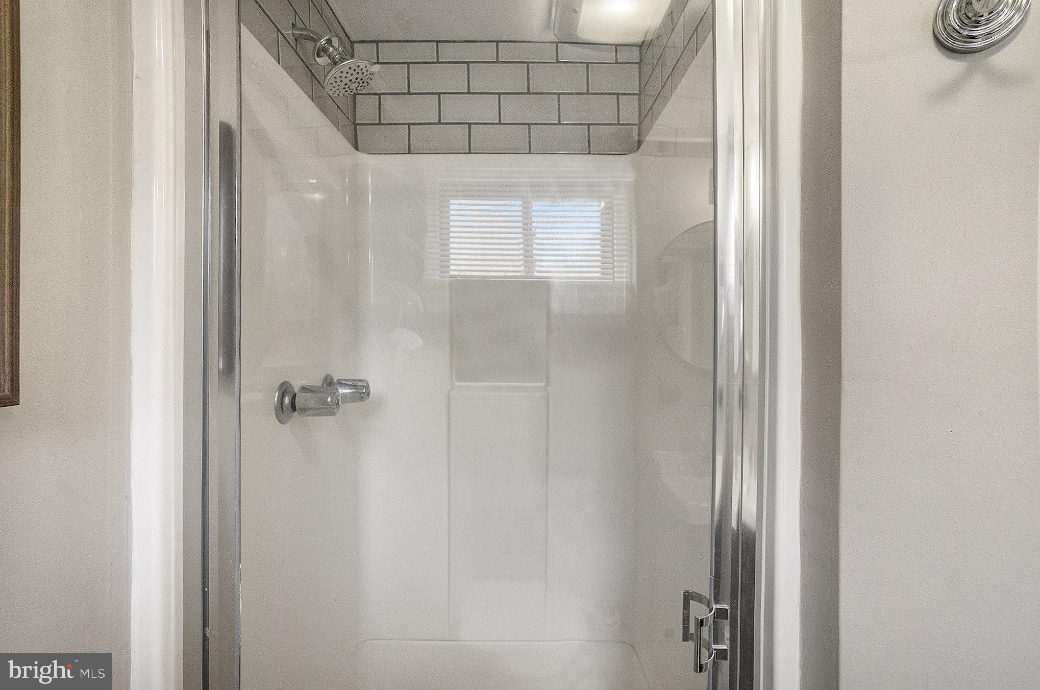 1271 Phoenixville Pike West Chester, PA 19380 - Photo 16 of 33 a bathroom with a window