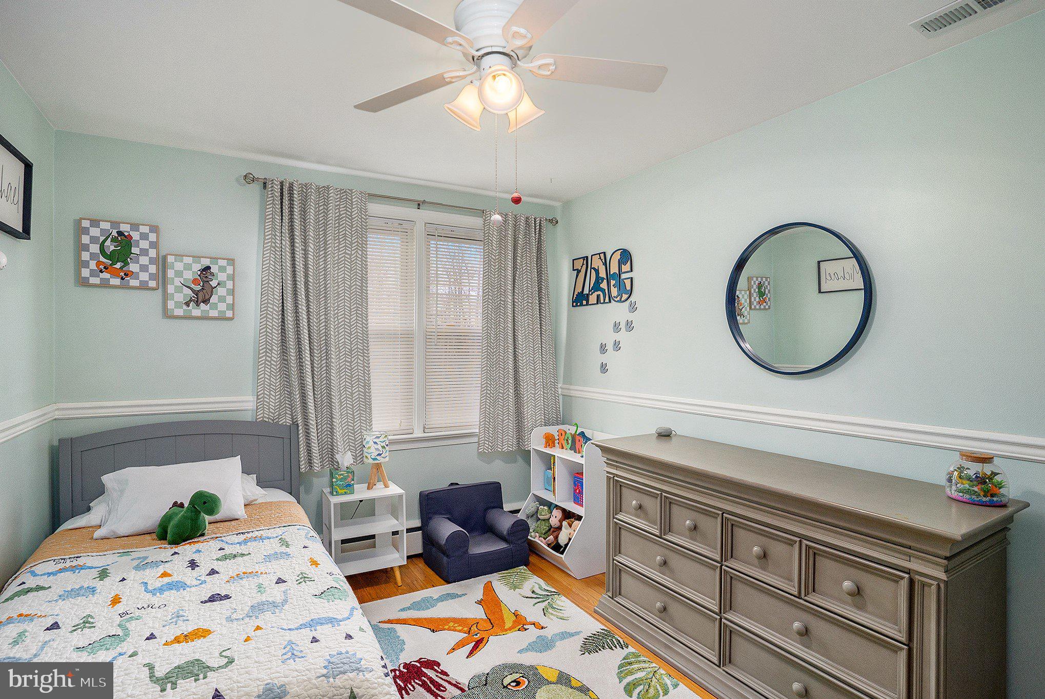 1271 Phoenixville Pike West Chester, PA 19380 - Photo 17 of 33 a bedroom with a bed and a chandelier