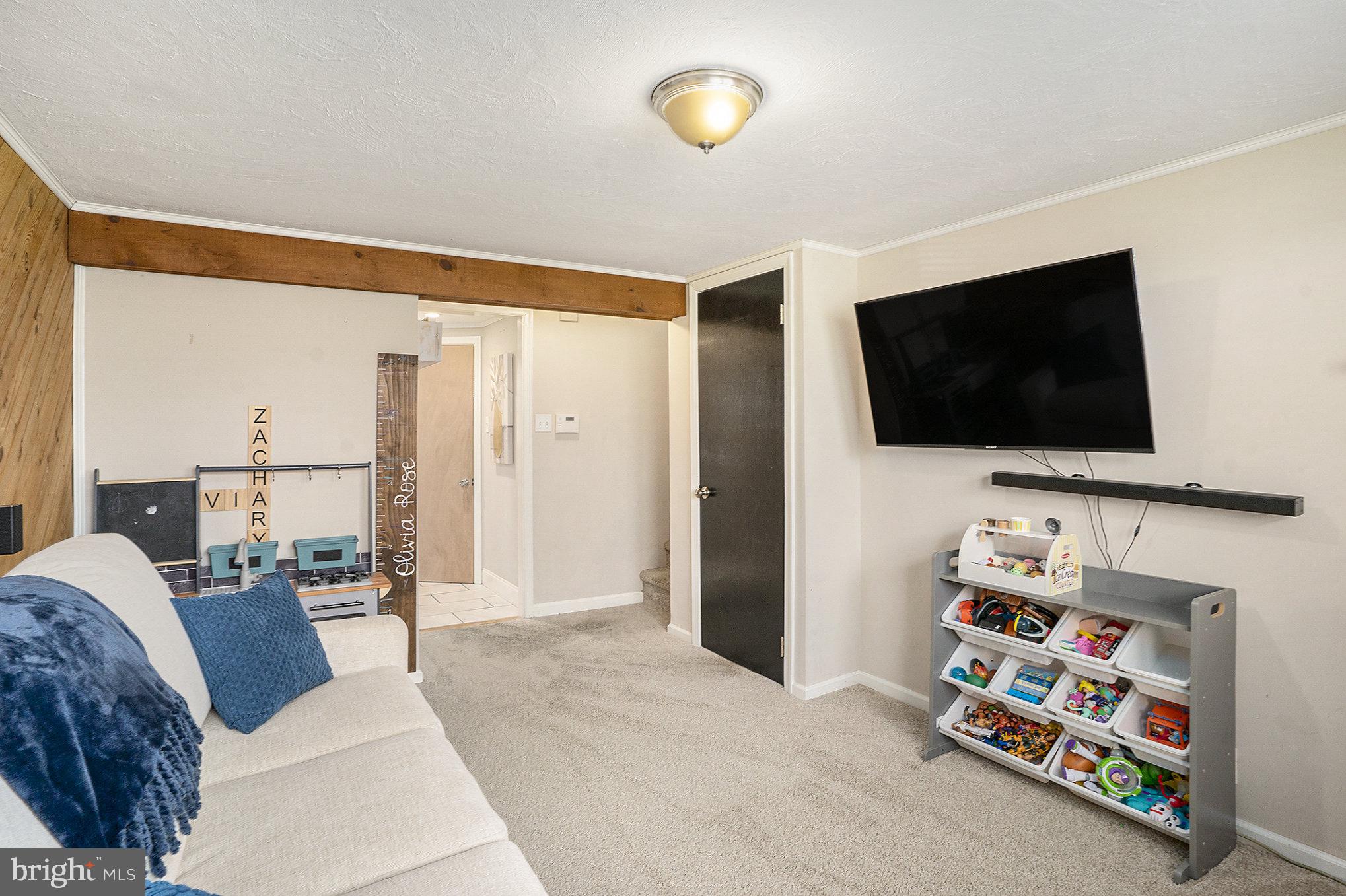 1271 Phoenixville Pike West Chester, PA 19380 - Photo 21 of 33 a living room with furniture and a flat screen tv