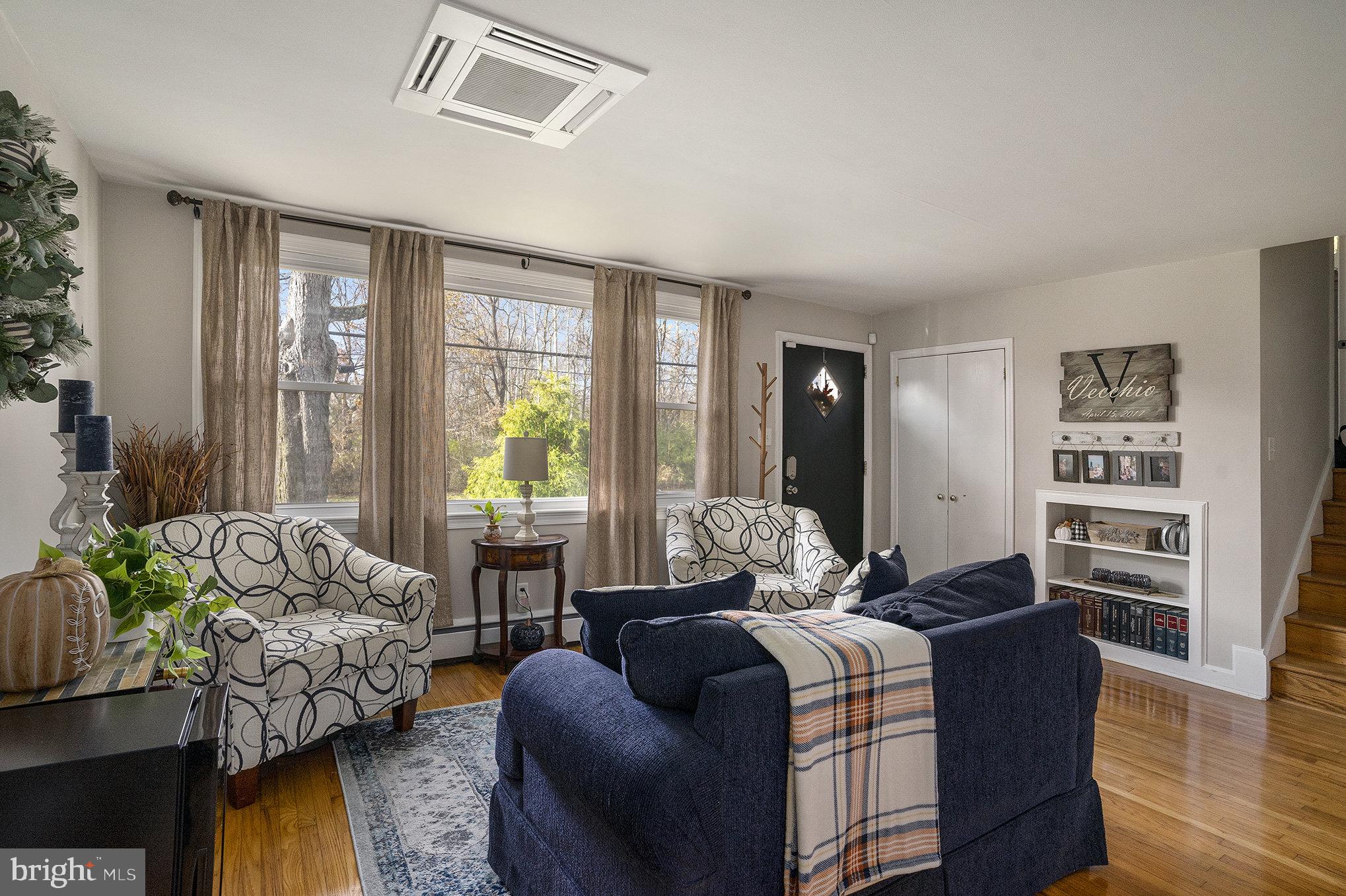 1271 Phoenixville Pike West Chester, PA 19380 - Photo 4 of 33 a living room with furniture and a large window