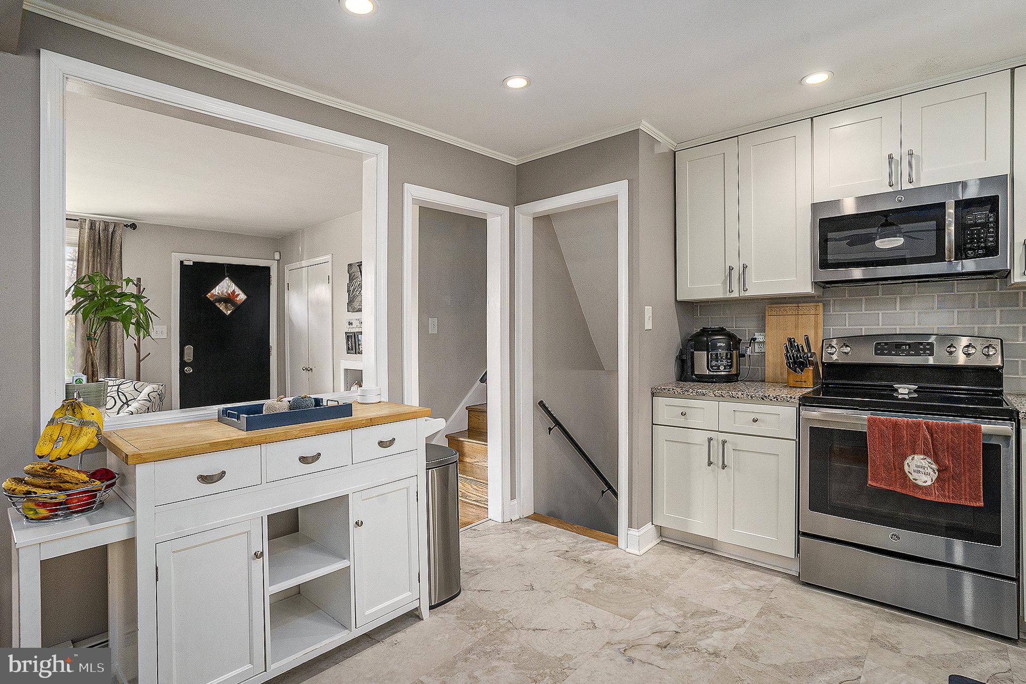 1271 Phoenixville Pike West Chester, PA 19380 - Photo 9 of 33 a kitchen with stainless steel appliances granite countertop a stove and a sink