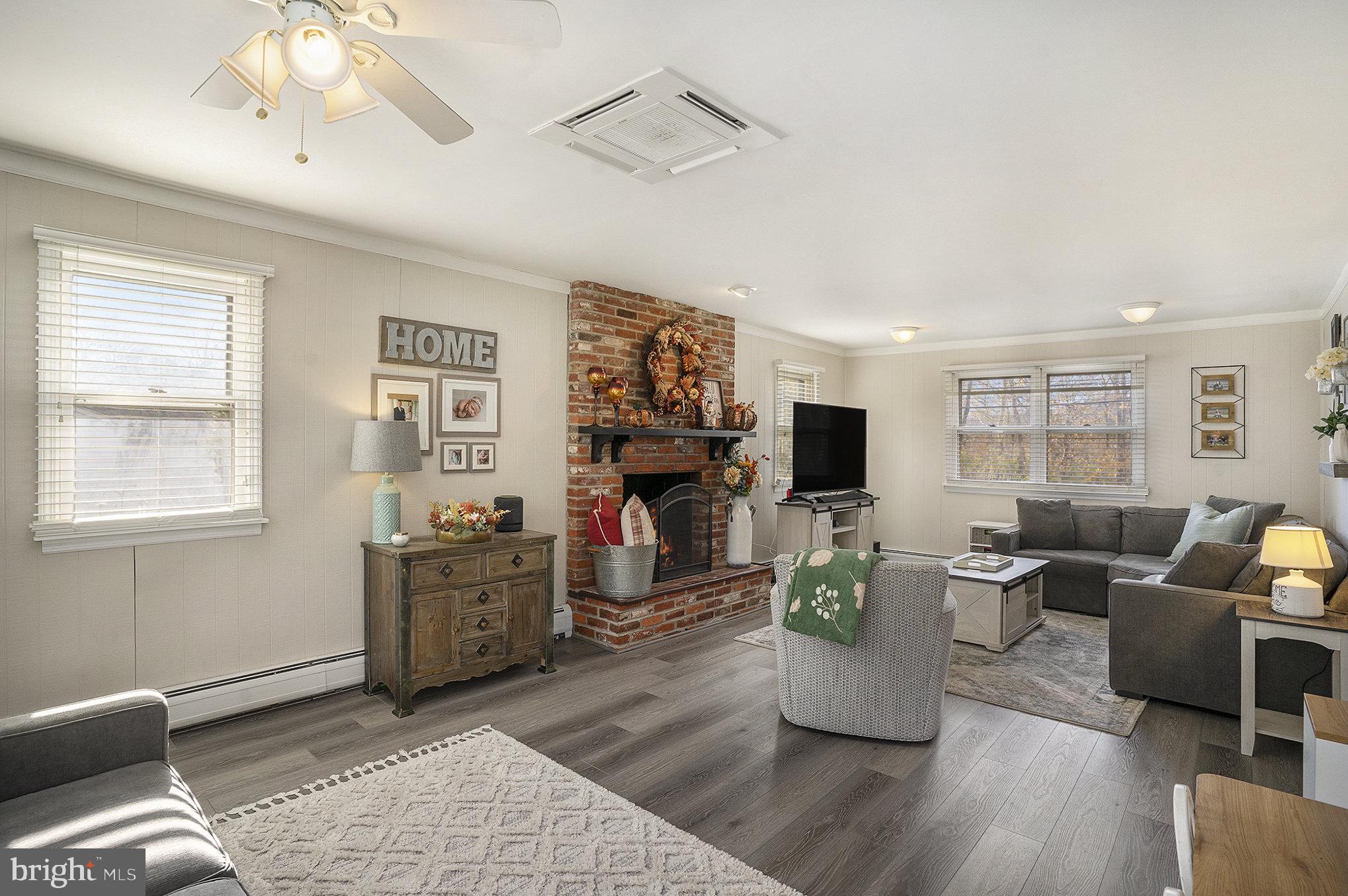 1271 Phoenixville Pike West Chester, PA 19380 - Photo 10 of 33 a living room with furniture and a flat screen tv