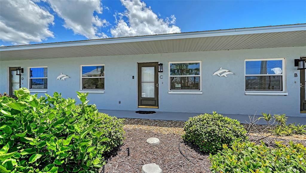 100 Bayshore Road, Unit C Nokomis, FL 34275 - Photo 2 of 39 a front view of a house