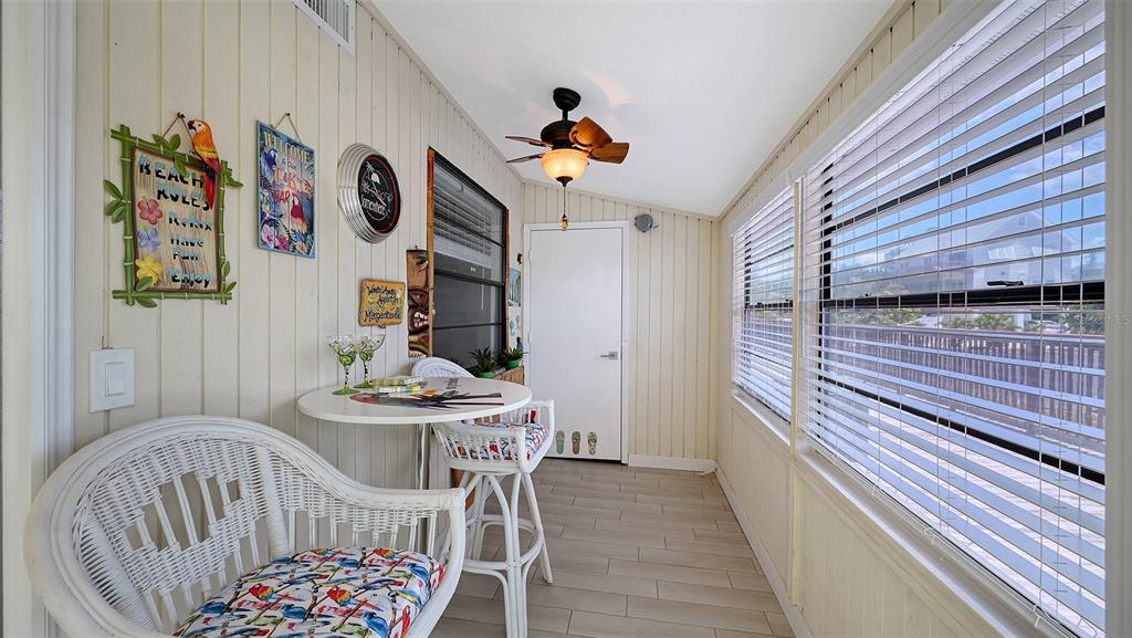 100 Bayshore Road, Unit C Nokomis, FL 34275 - Photo 22 of 39 a view of a dining room with furniture