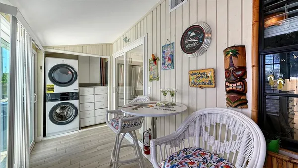 a view of a hallway with washer and dryer