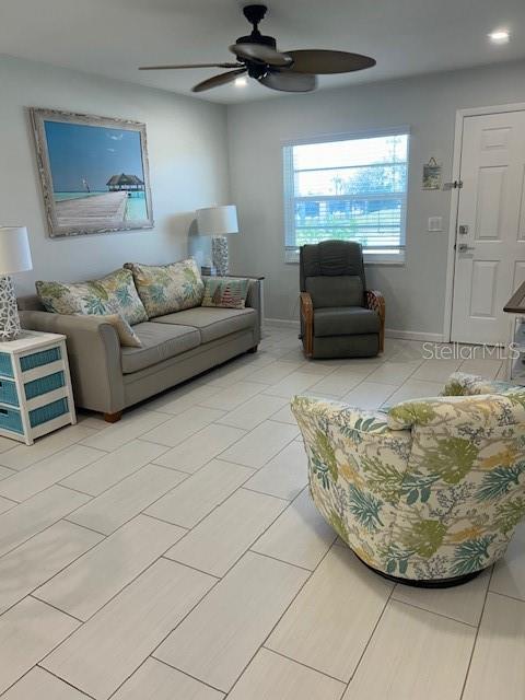 100 Bayshore Road, Unit C Nokomis, FL 34275 - Photo 8 of 39 a living room with furniture and a large window