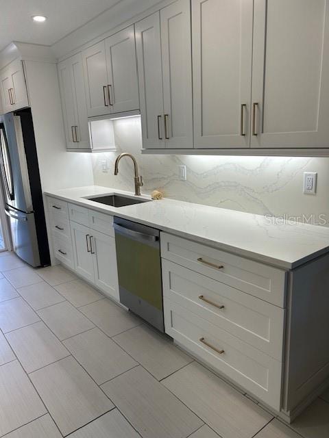 100 Bayshore Road, Unit C Nokomis, FL 34275 - Photo 10 of 39 a kitchen with cabinets and appliances