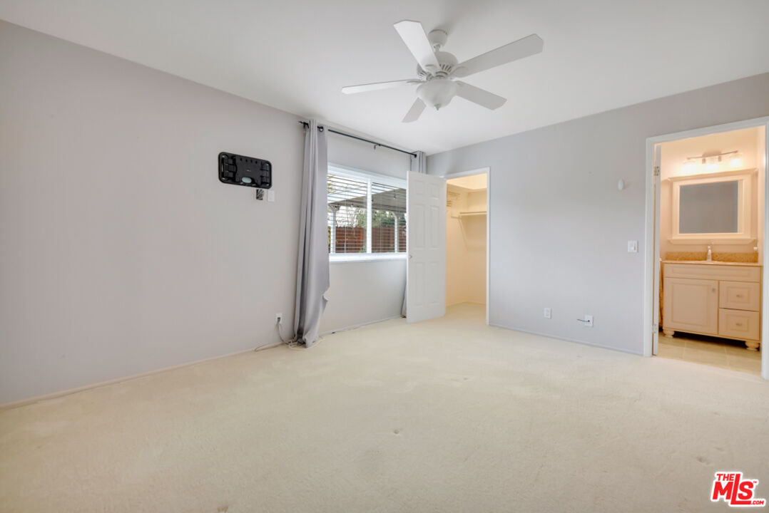 13480 Laurelhurst Road Moorpark, CA 93021 - Photo 17 of 34 an empty room with windows