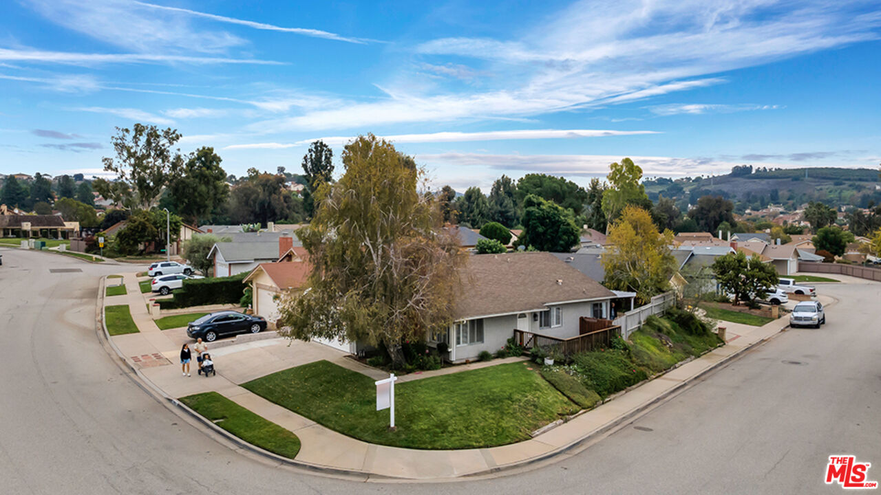 13480 Laurelhurst Road Moorpark, CA 93021 - Photo 27 of 34 a view of a house with a garden and pathway