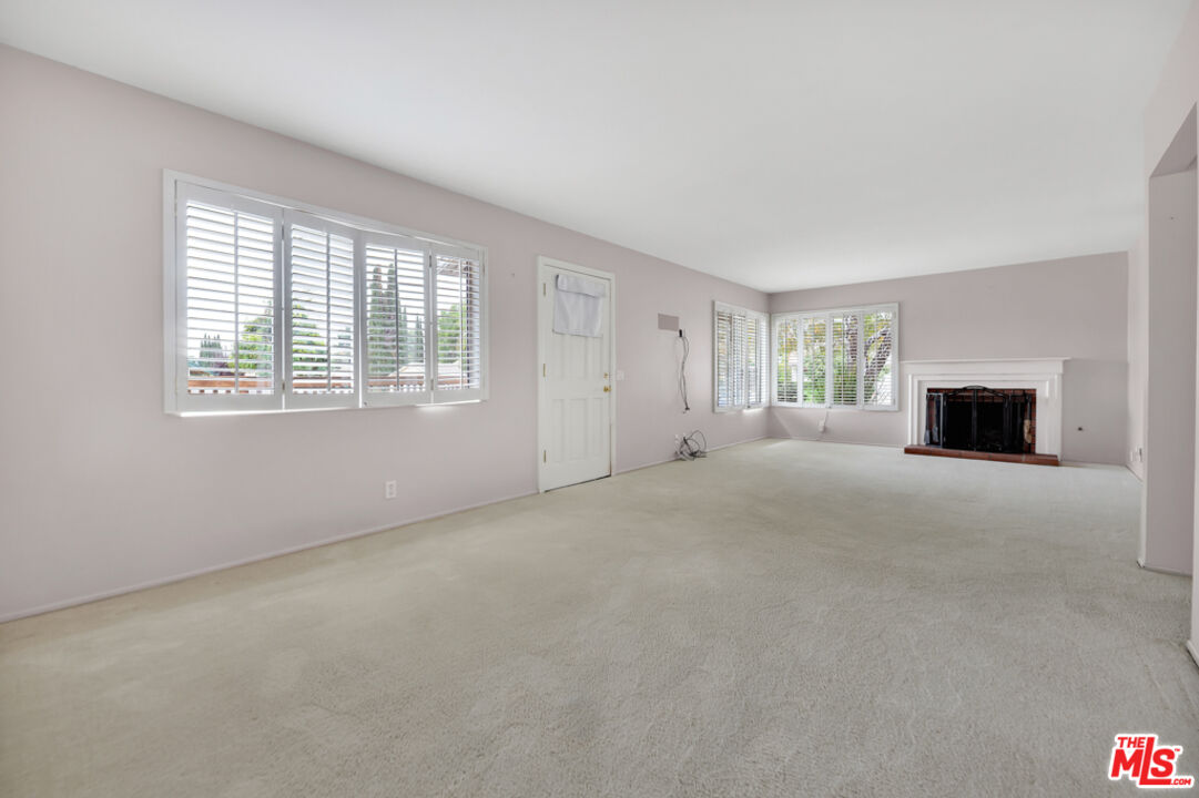 13480 Laurelhurst Road Moorpark, CA 93021 - Photo 3 of 34 a view of an empty room with a window