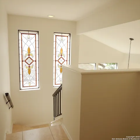 a view of walk in closet with window