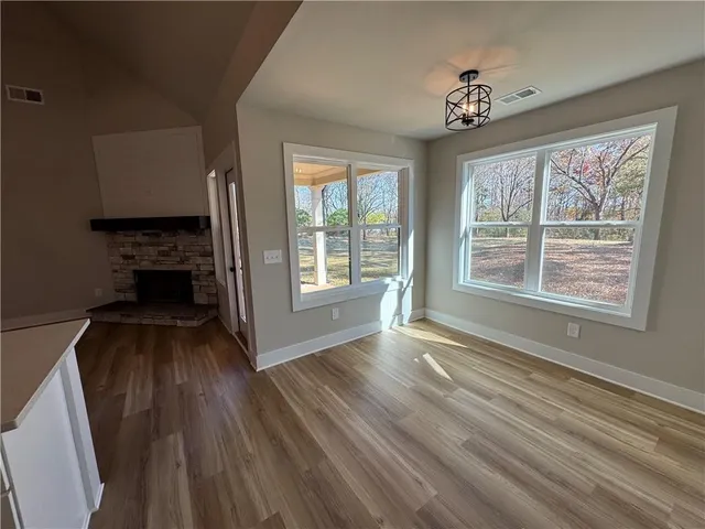 a view of livingroom with hardwood floor and window