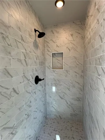 a bathroom with a sink and mirror