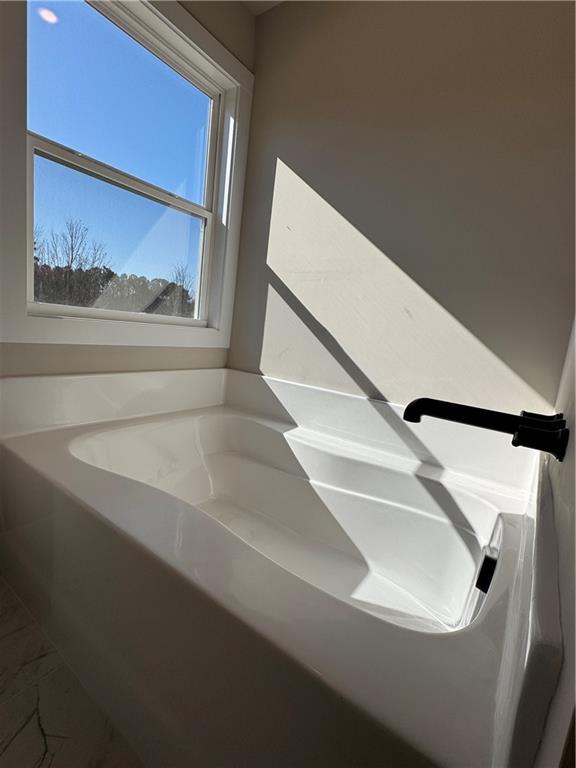 1612 Pickens Street Ball Ground, GA 30107 - Photo 24 of 53 a bathroom with a sink and mirror