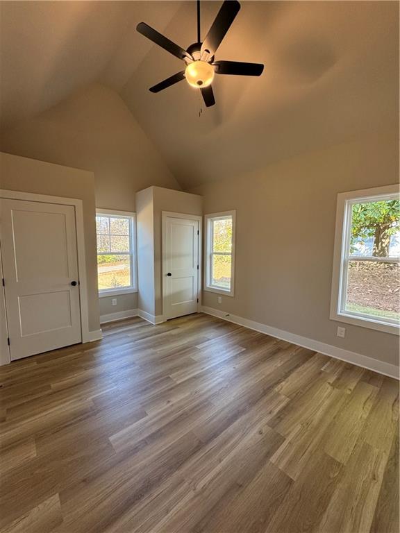 1612 Pickens Street Ball Ground, GA 30107 - Photo 28 of 53 a view of an empty room with window and wooden floor