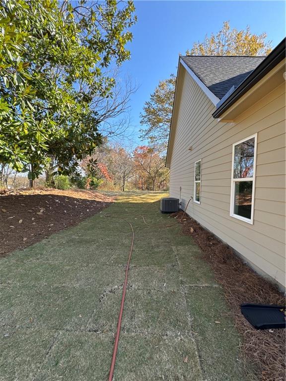 1612 Pickens Street Ball Ground, GA 30107 - Photo 41 of 53 a view of back yard of the house
