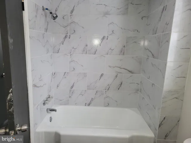 a bathroom with a bathtub