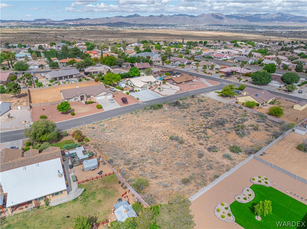 1400 Hidden Canyon Road Kingman, AZ 86401 - Photo 13 of 20 Expansive lot featuring natural desert landscaping, surrounded by established residential properties