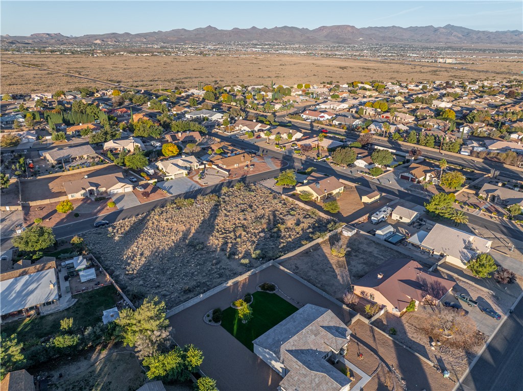 1400 Hidden Canyon Road Kingman, AZ 86401 - Photo 18 of 20 Aerial view of the neighborhood showcasing surrounding properties and distant mountains