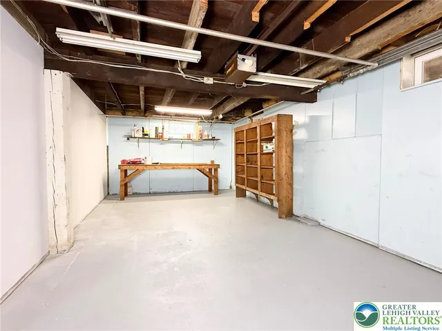 a view of a yard with large trees