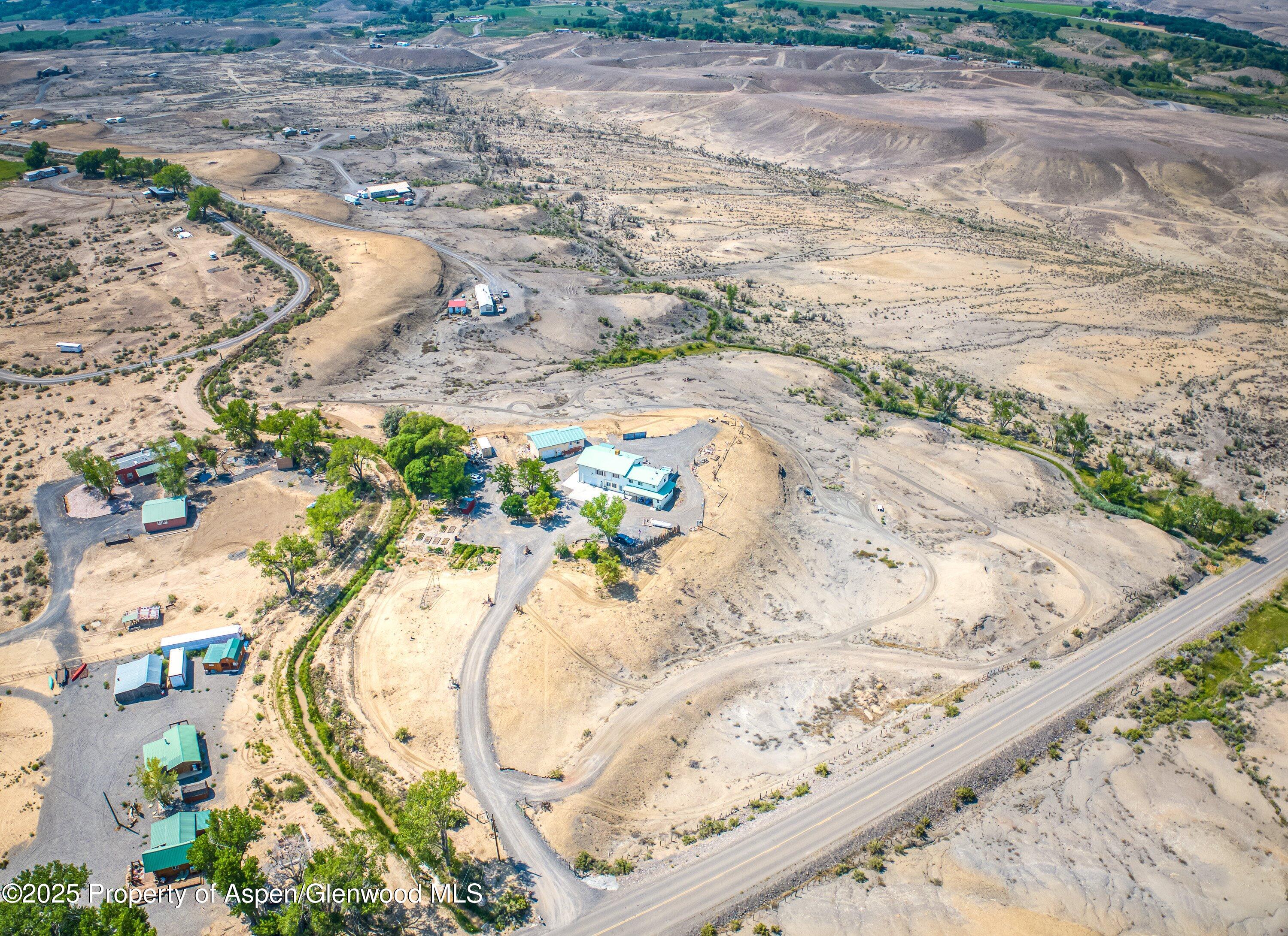 12602 25 Mesa Road Delta, CO 81416 - Photo 53 of 96 a view of swimming pool with a yard