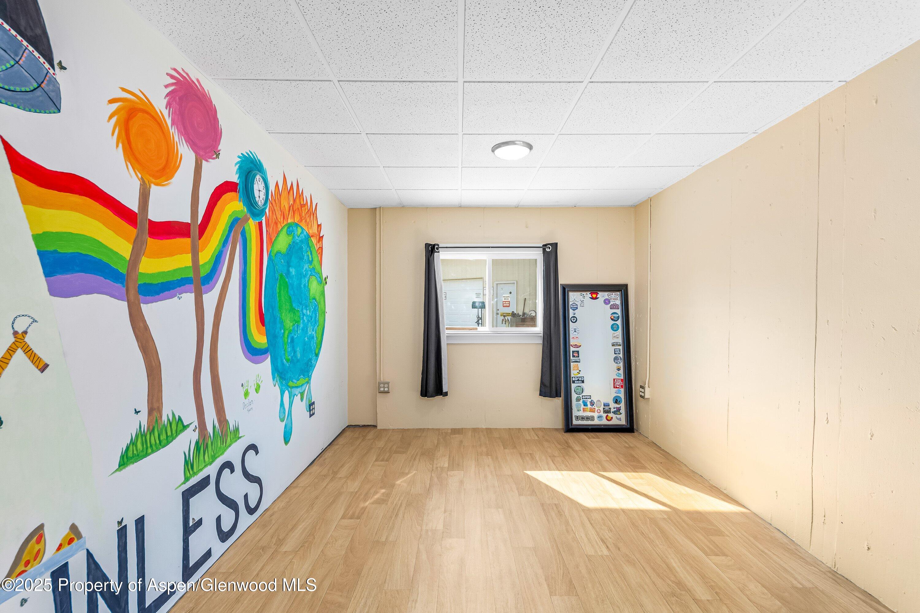12602 25 Mesa Road Delta, CO 81416 - Photo 8 of 96 a view of an entryway with wooden floor