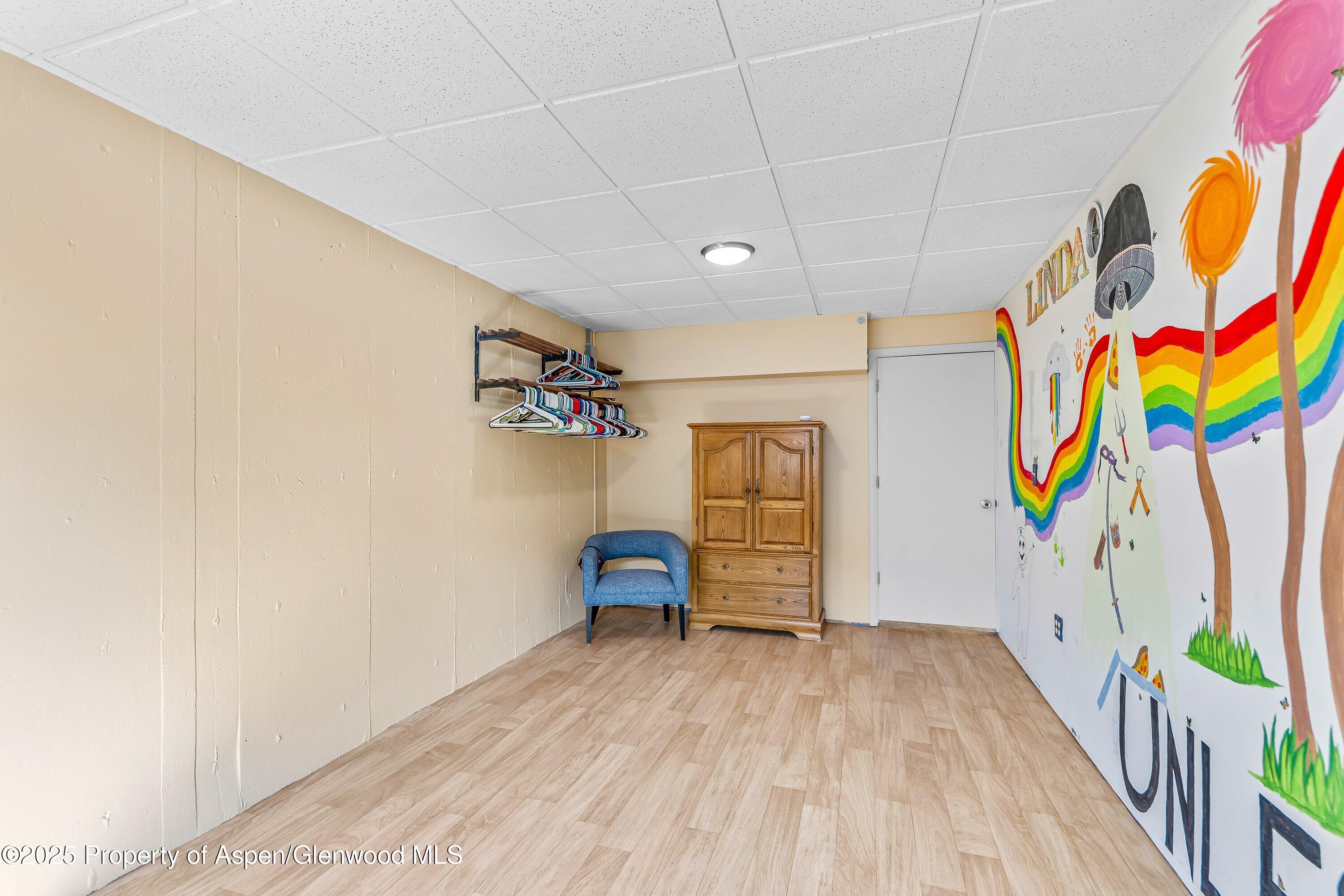 12602 25 Mesa Road Delta, CO 81416 - Photo 9 of 96 a view of a bedroom with a bed and toys