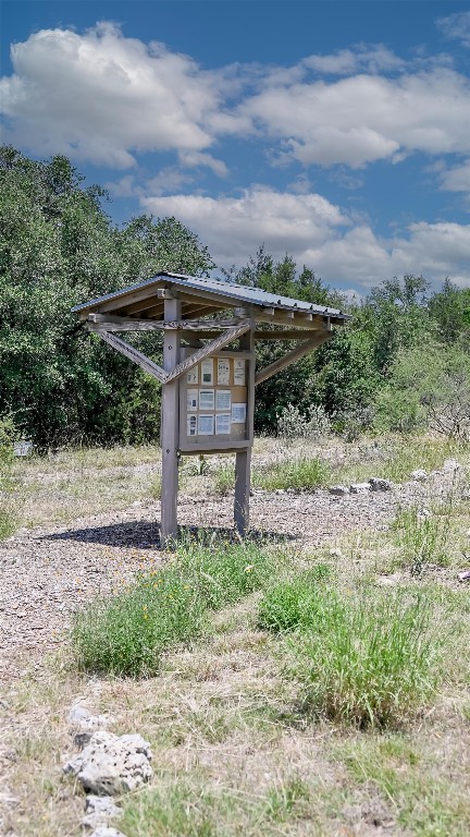 373 Leaning Rock Ridge Austin, TX 78737 - Photo 11 of 39 a view of a pathway with a yard