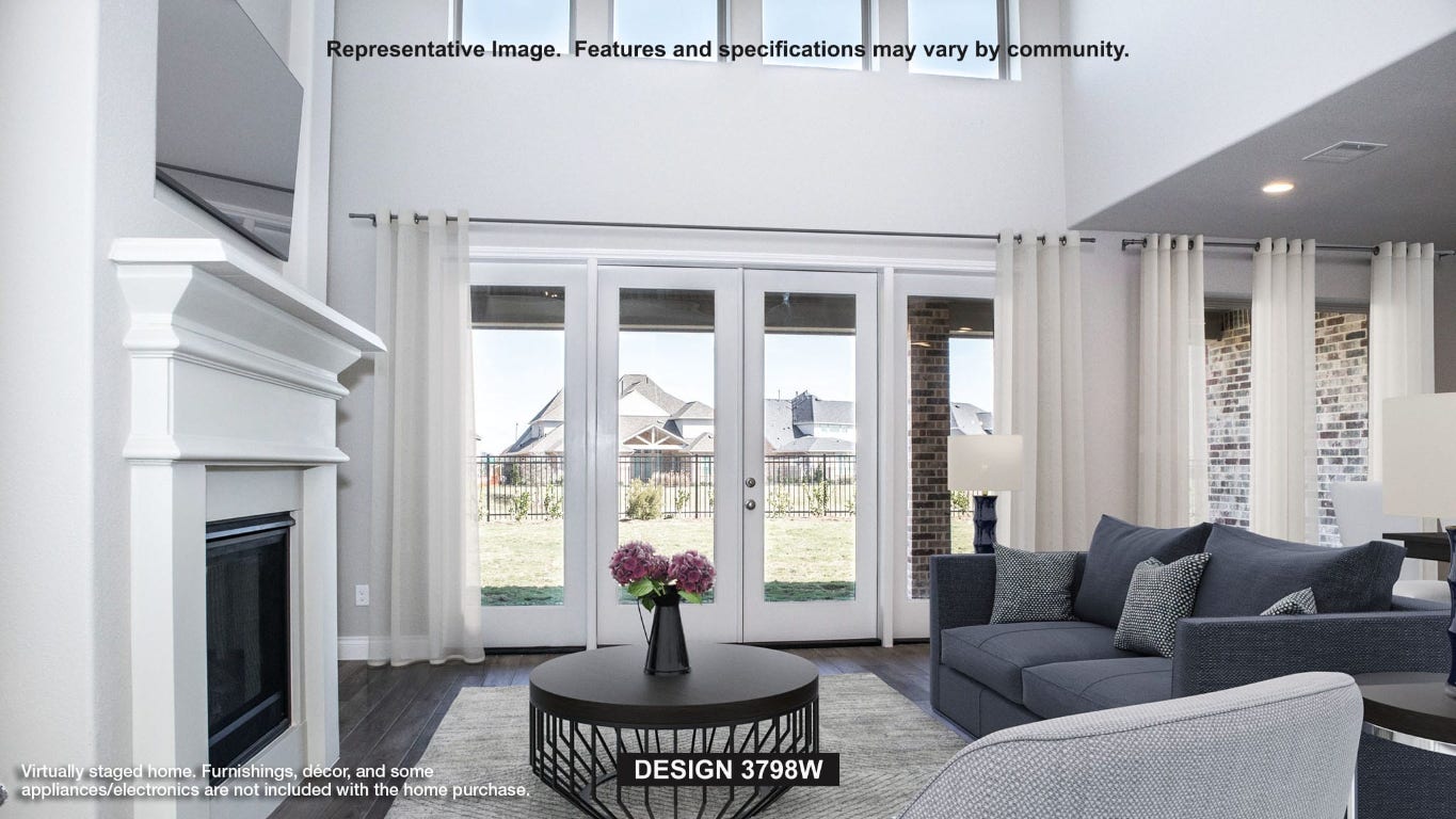 373 Leaning Rock Ridge Austin, TX 78737 - Photo 3 of 39 a living room with furniture fireplace and a large window