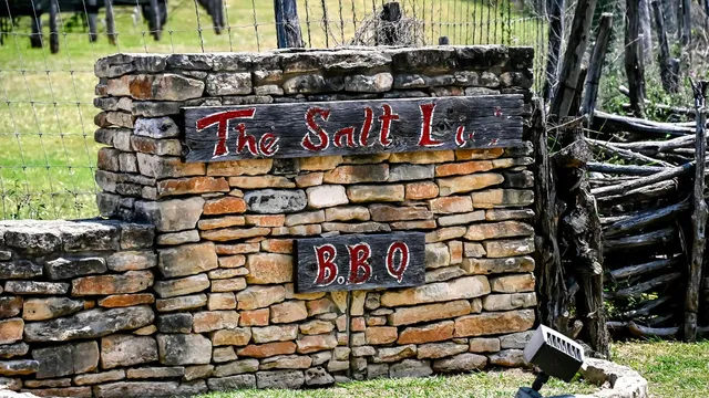 a view of a house with sitting area and roof