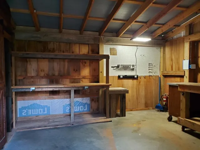 a picture of flowers sitting on a sidewalk