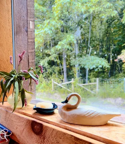 a view of a room that has a window in it