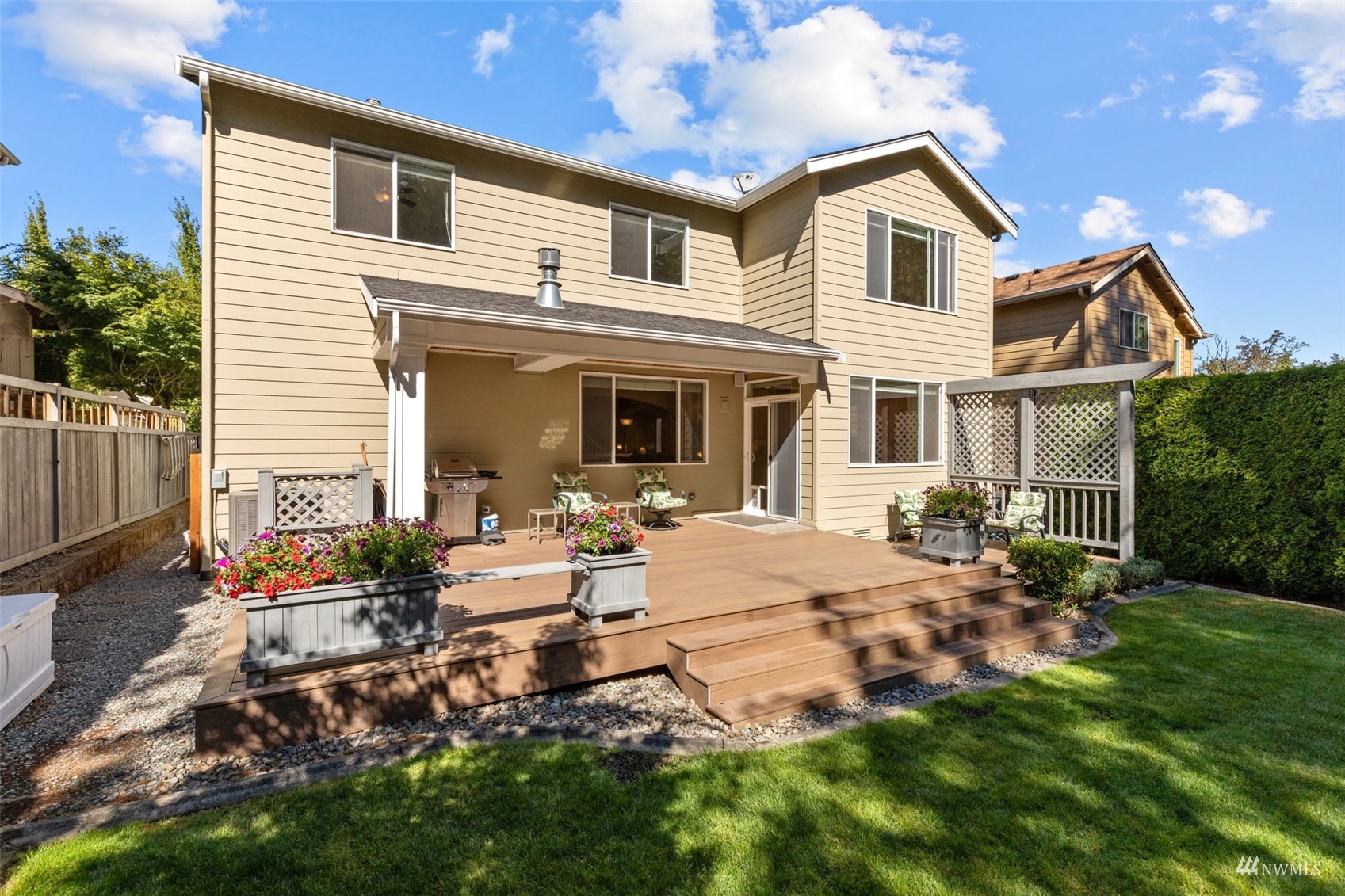 16136 Parkside Way Southeast Renton, WA 98058 - Photo 36 of 40 a view of a house with backyard and sitting area