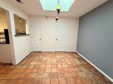 5045 Thunder Road Dallas, TX 75244 - Photo 22 of 28 a view of an empty room and kitchen