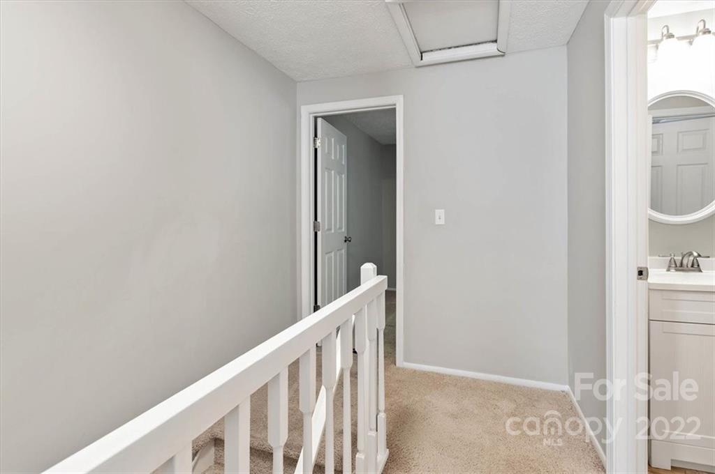 1235 Scaleybark Road, Unit E Charlotte, NC 28209 - Photo 15 of 23 a view of a hallway