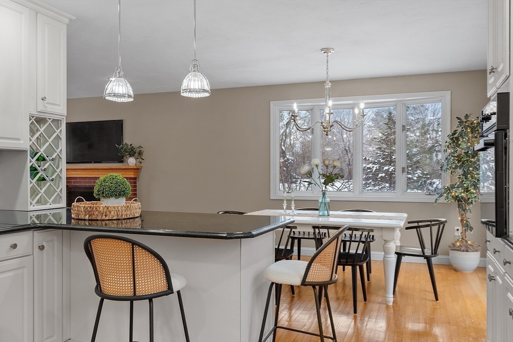 30 Duck Road Reading, MA 01867 - Photo 17 of 42 a view of a dining room with furniture window and wooden floor