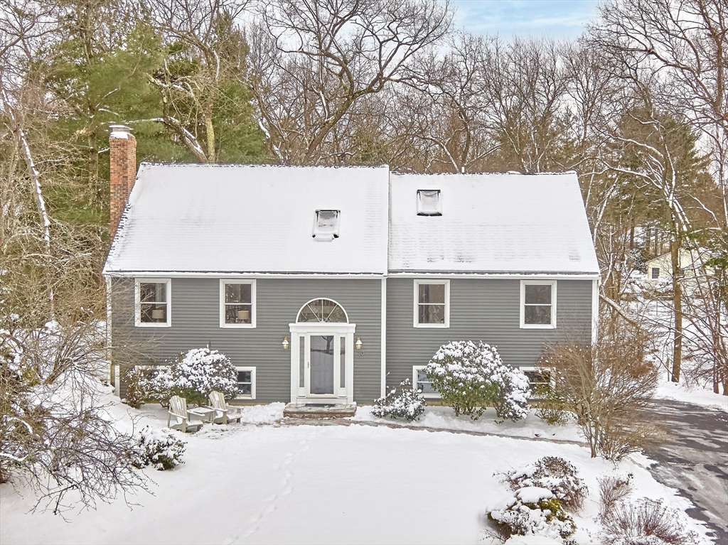 30 Duck Road Reading, MA 01867 - Photo 2 of 42 a front view of a house with a yard