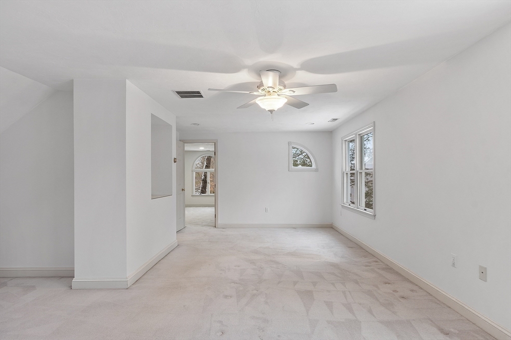 30 Duck Road Reading, MA 01867 - Photo 29 of 42 a view of an empty room with a window