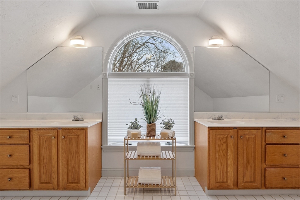 30 Duck Road Reading, MA 01867 - Photo 31 of 42 a view of a dining room with furniture and wooden floor