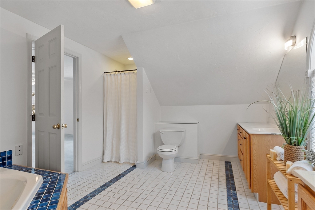 30 Duck Road Reading, MA 01867 - Photo 32 of 42 a bathroom with a toilet and a shower